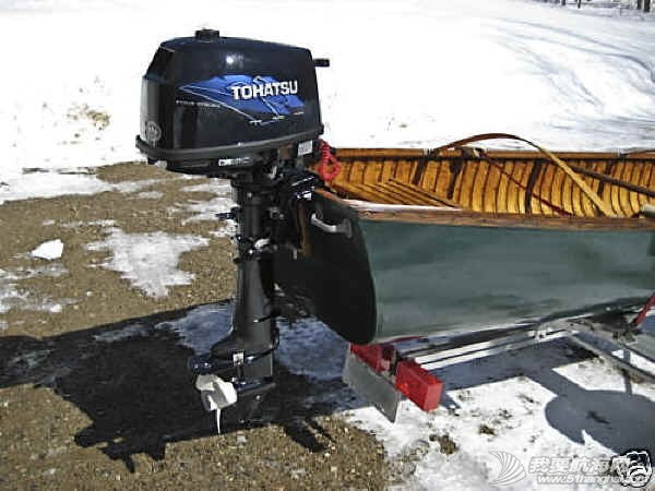 Trailex-SUT-200-S-Wood-Canvas-Canoe-4HP-Motor-Square-Stern.jpg